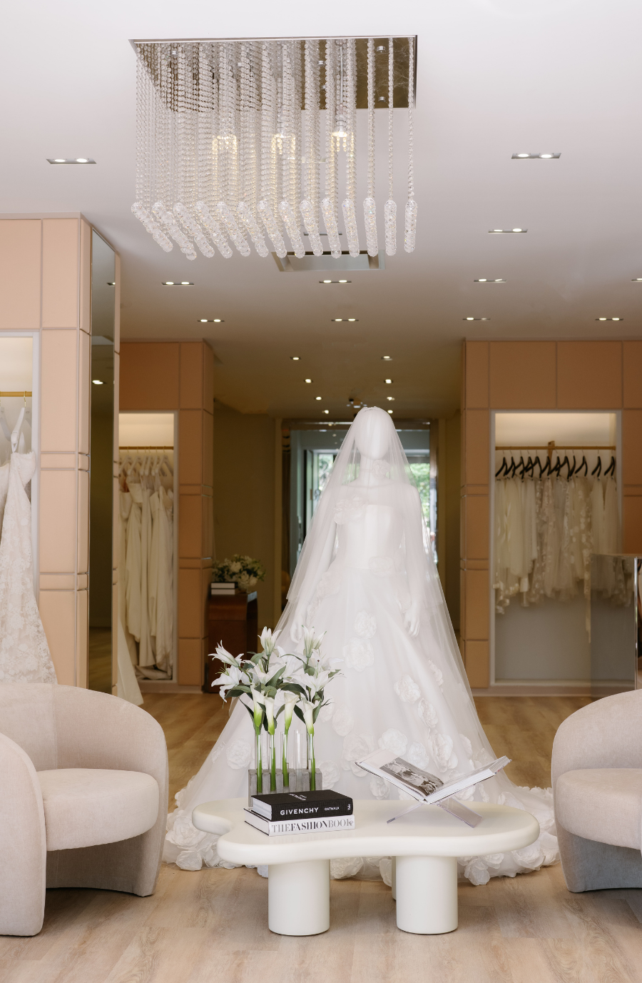 image shows a mannequin wearing a wedding dress in sareh nouri bridal boutique in new york