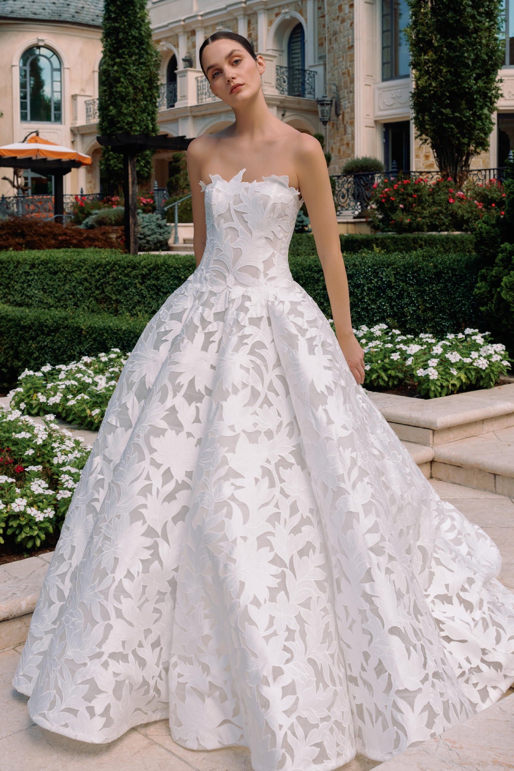 Model wearing ballgown Style dress