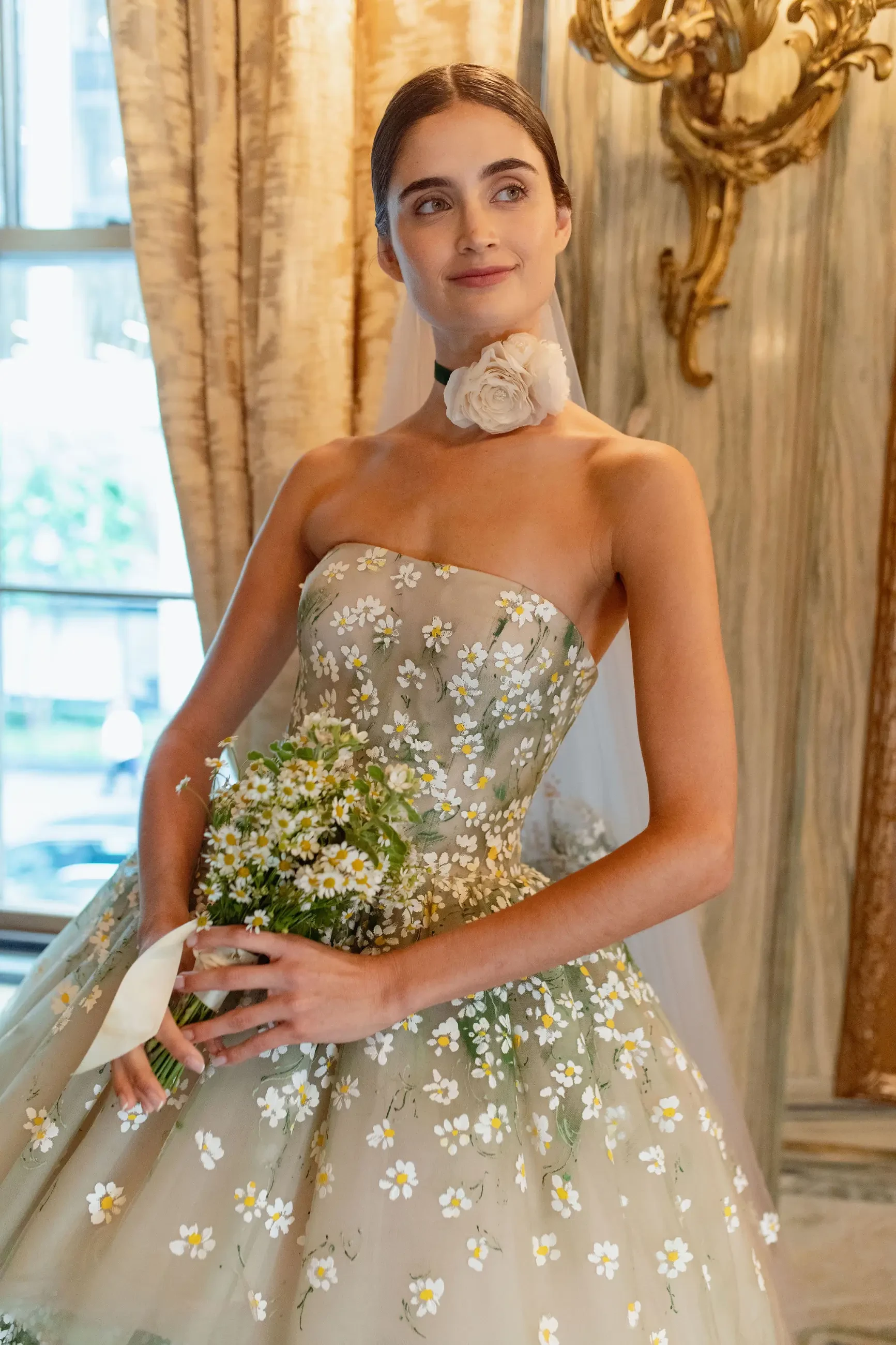 image shows a model wearing the edelweiss gown from sareh nouri