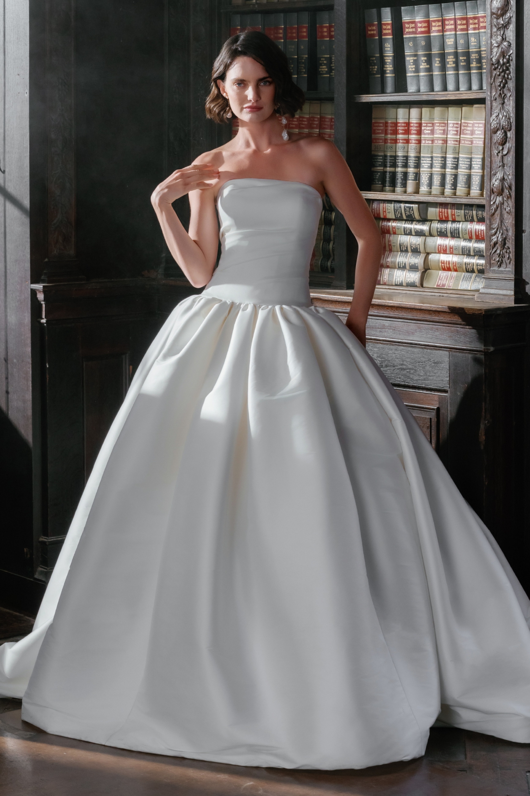 Model wearing a drop waist style dress