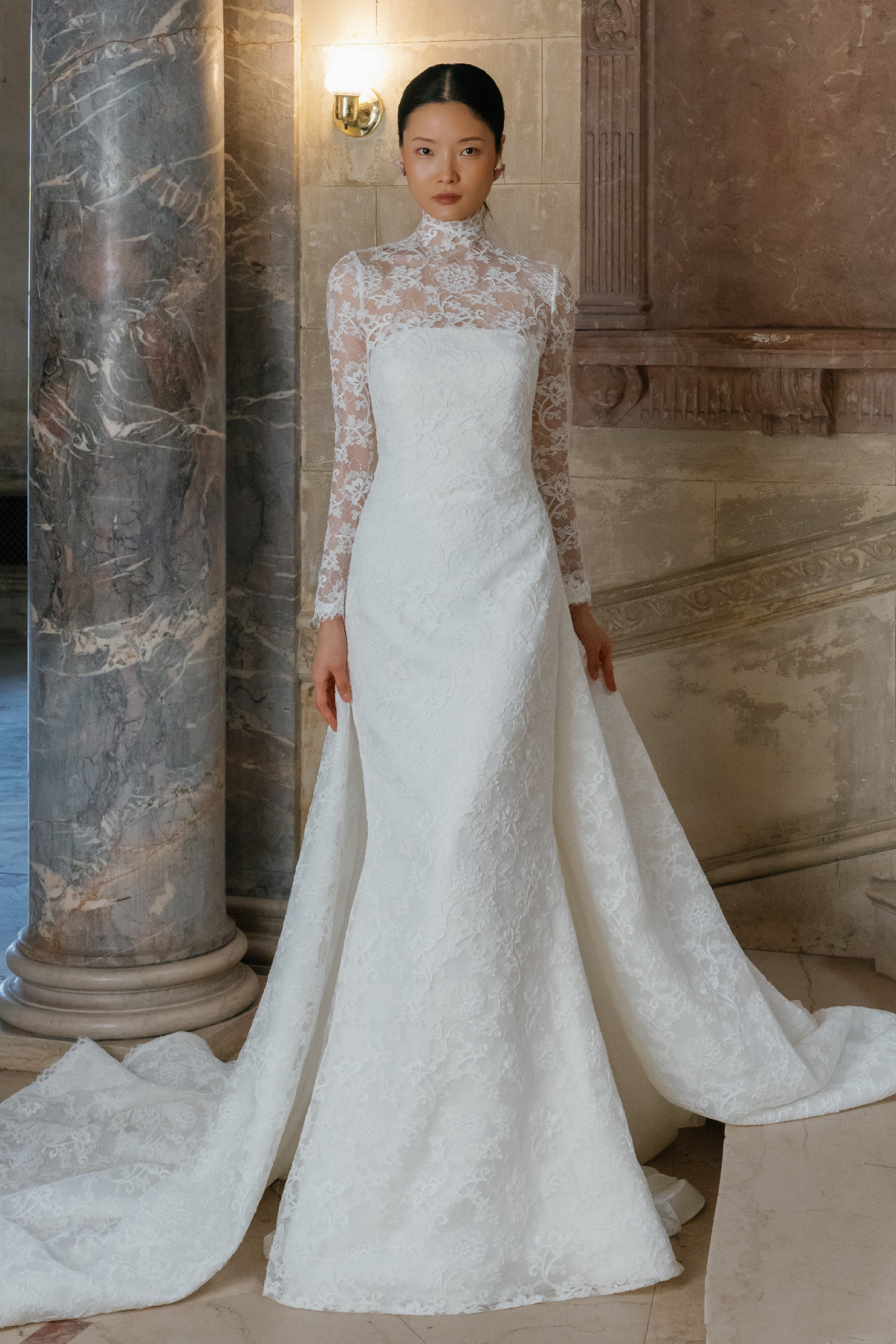 Model wearing a trumpet style dress