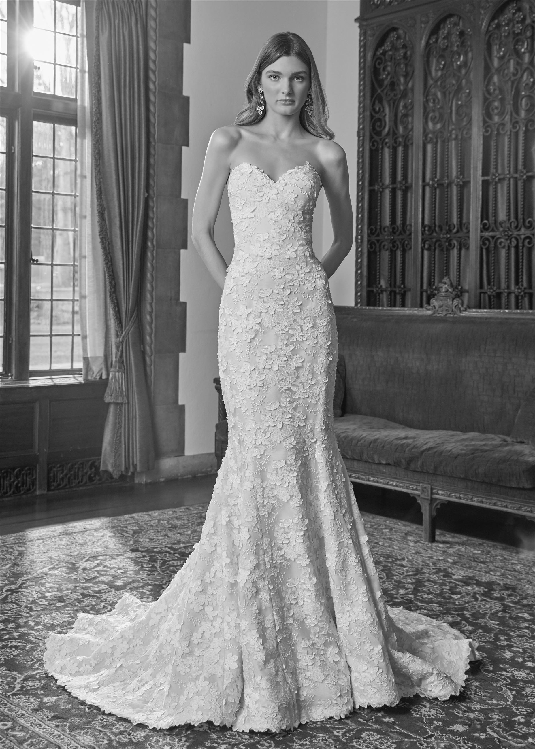 Model wearing a slim flare wedding dress