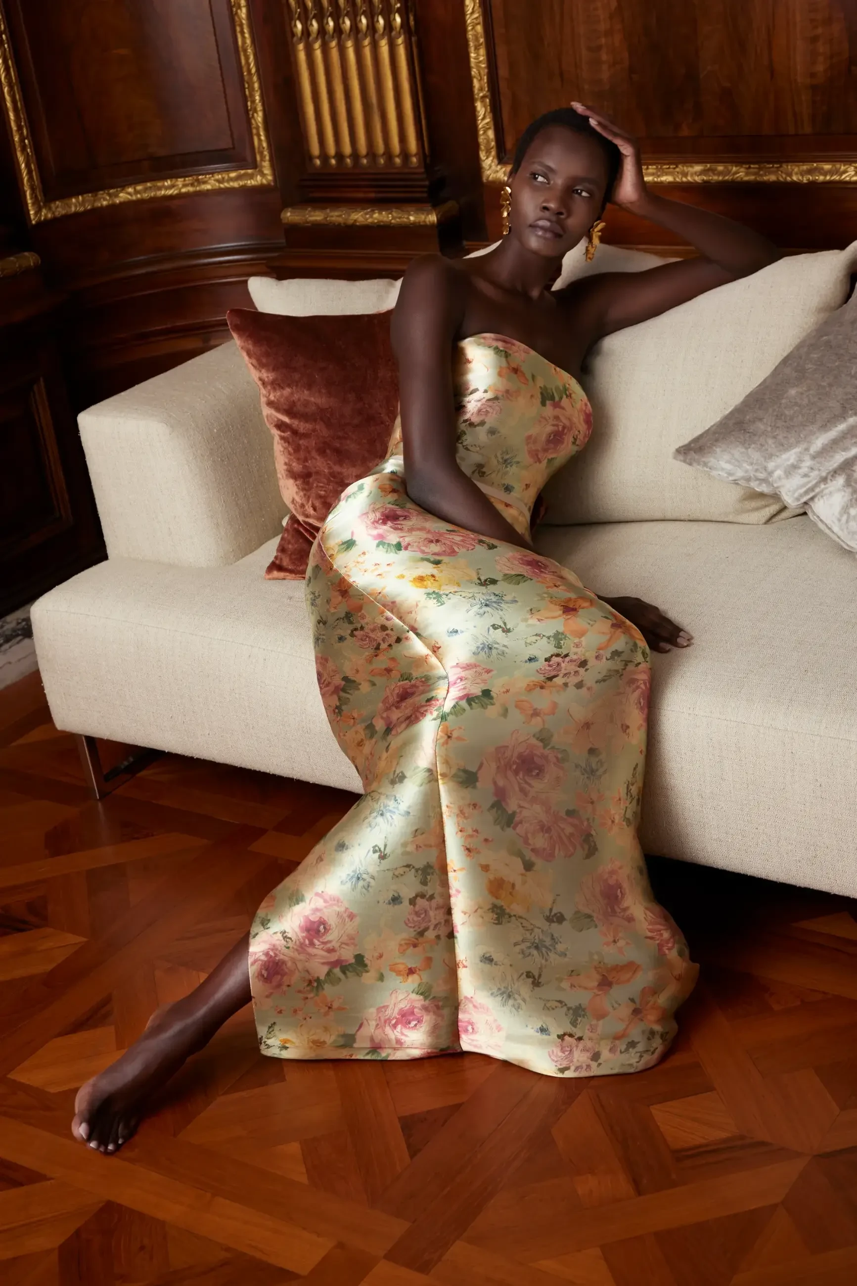 Model is wearing a printed organza column evening gown by sareh nouri