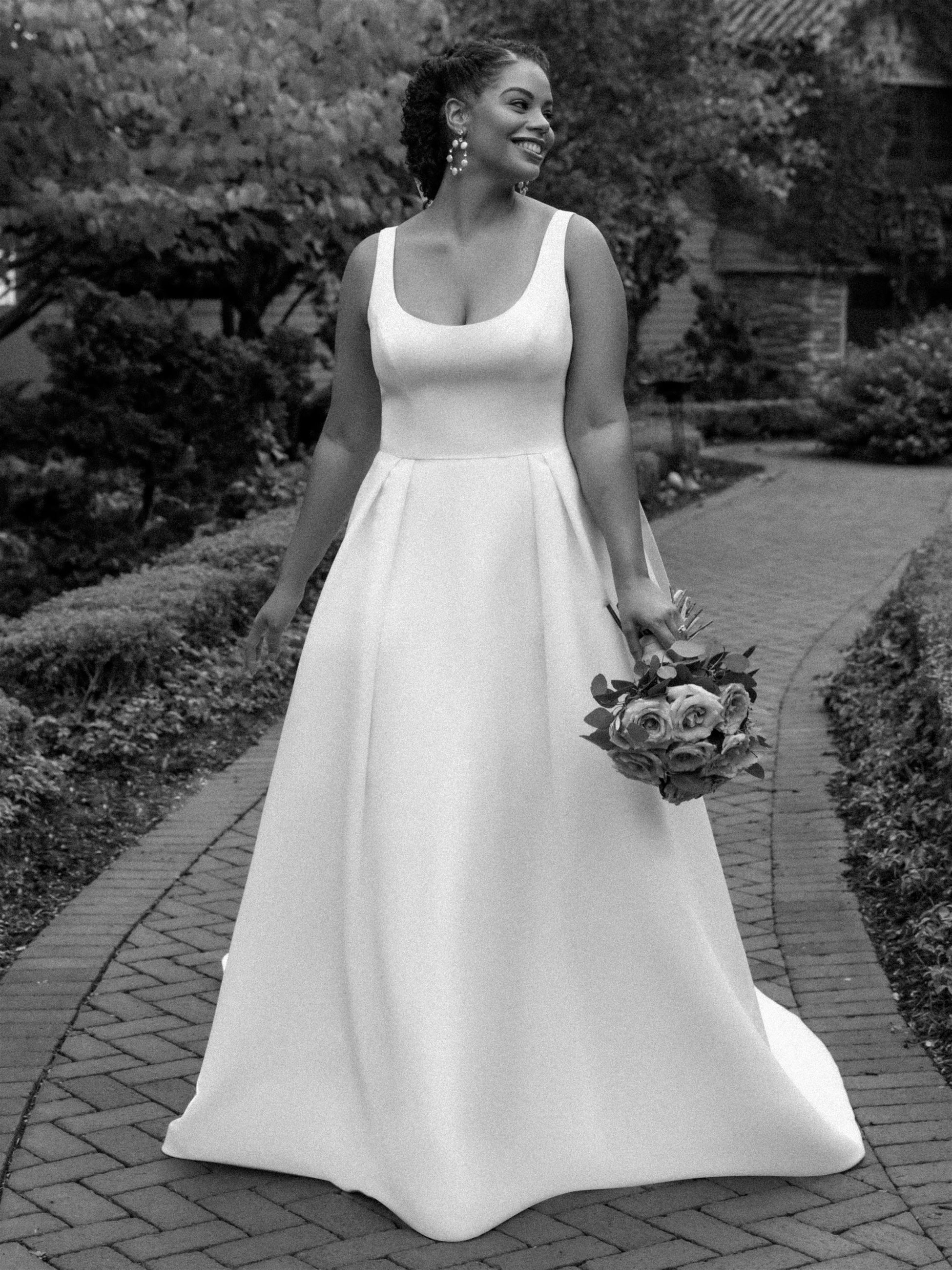 bride wearing Sareh Nouri plus size wedding dress