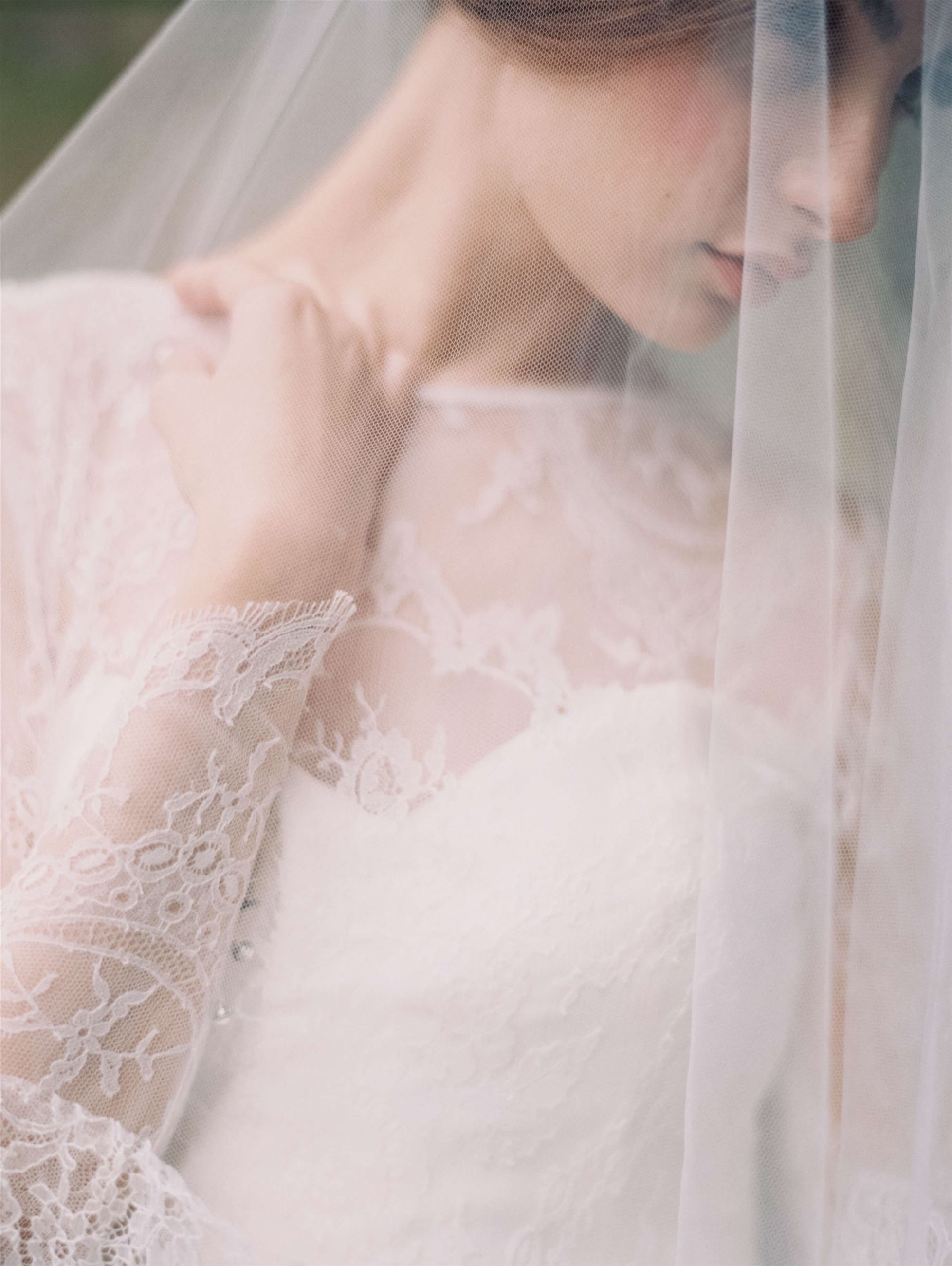 Model wearing bridal gown under the veil