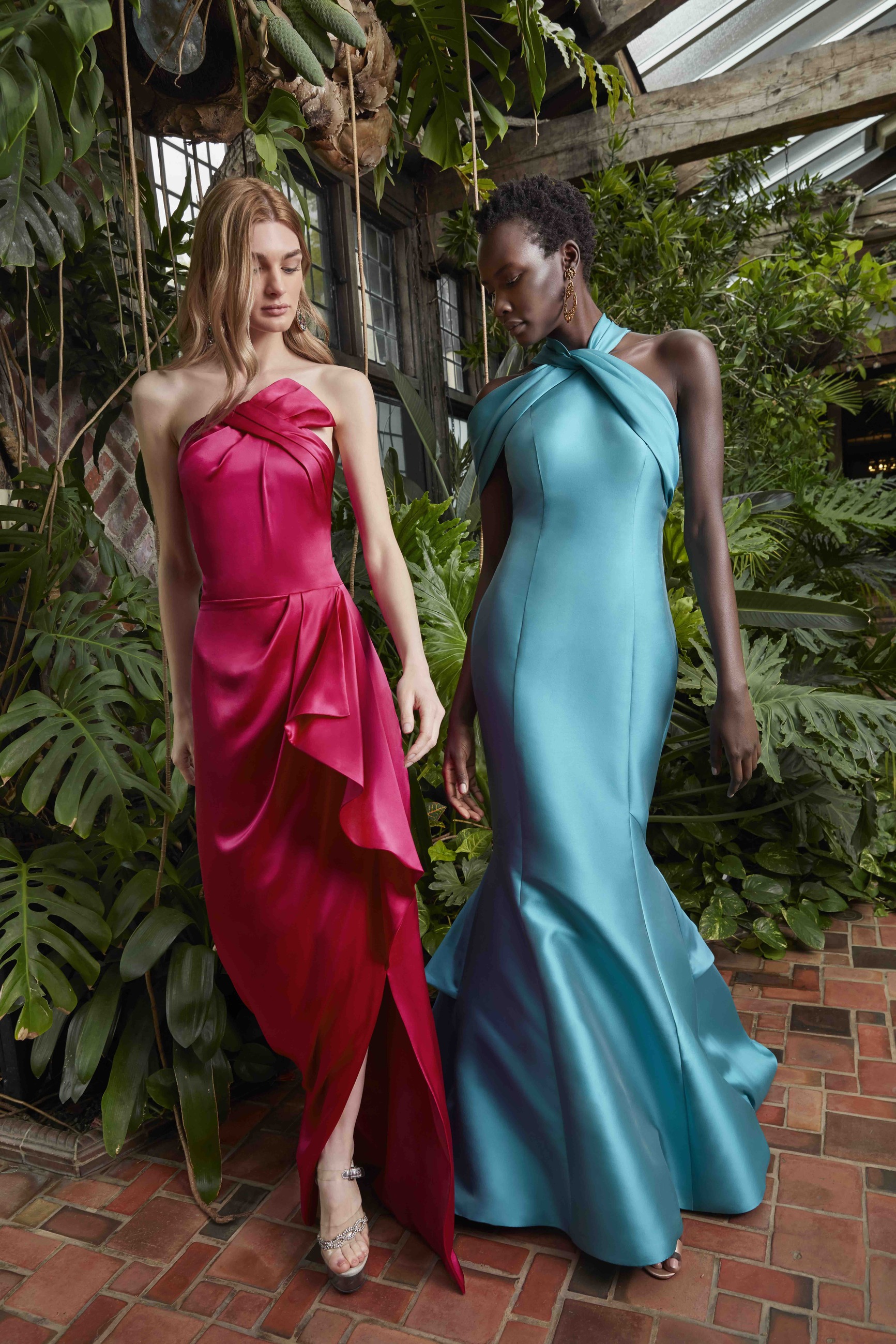 Models wearing evening dresses