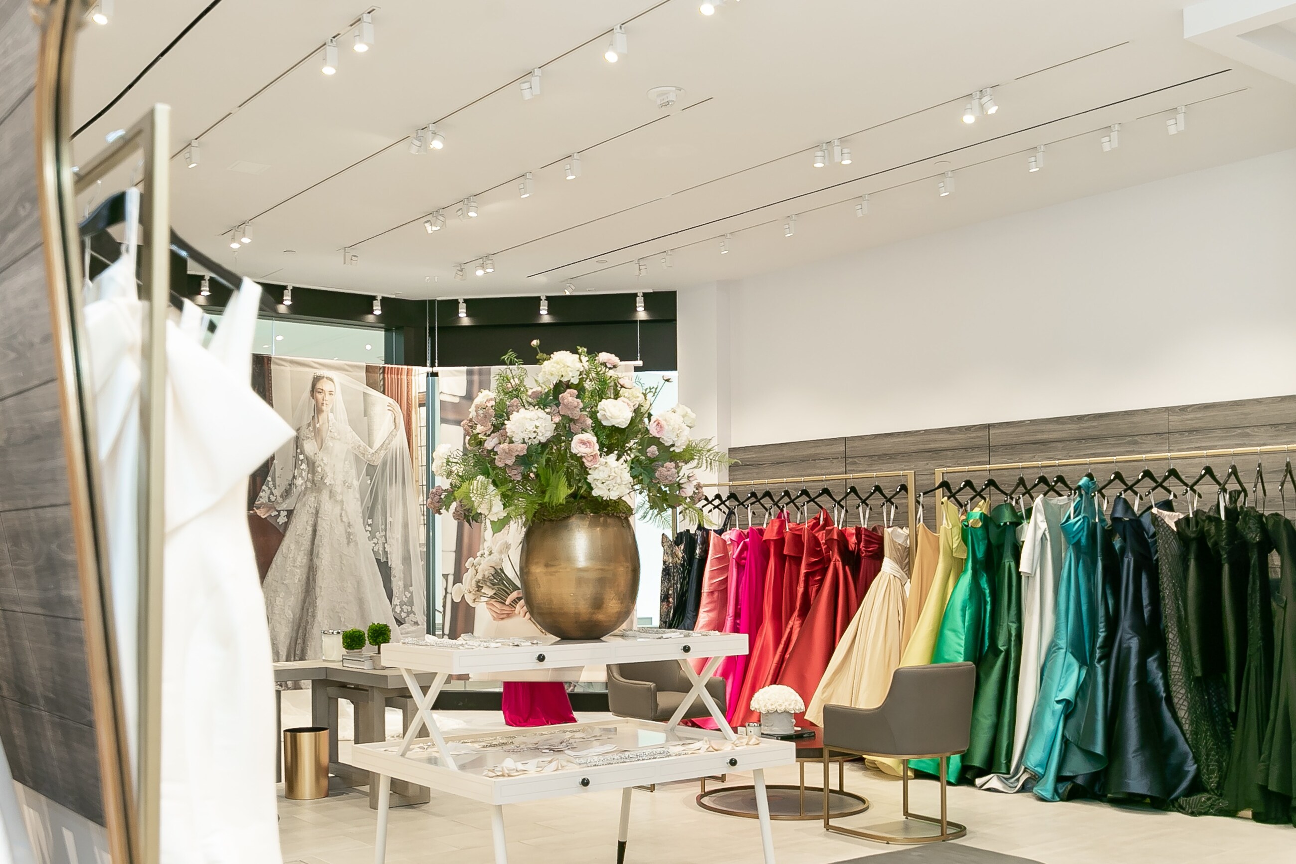Photo of the showroom interior with a gowns