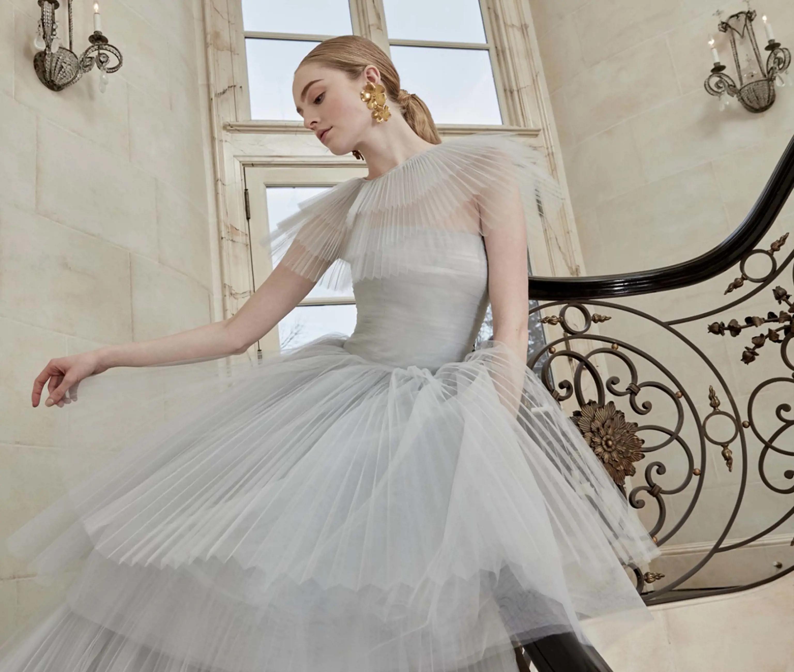 Bride on staircase wearing Tulle Dress from Sareh Nouri Spring 2023 collection